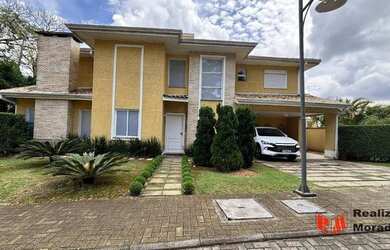 Imagem: A casa em condomínio possui 4 Dormitórios, 5 Banheiros, 4