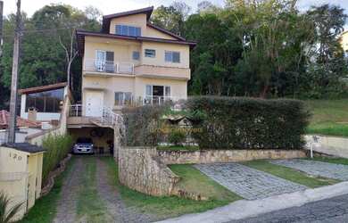 Imagem: A casa em condomínio possui 4 Dormitórios, 5 Banheiros, 5