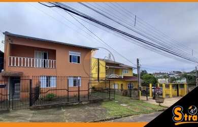 Imagem: A casa possui 5 Dormitórios, 2 Banheiros, 2 Vagas na garagem