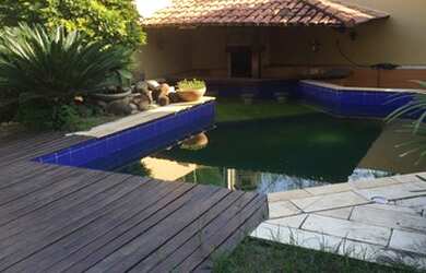 Imagem: A casa possui 5 Dormitórios, 5 Banheiros, 4 Vagas na garagem