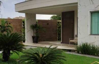 Imagem: A casa possui 3 Dormitórios, 5 Banheiros, 5 Vagas na garagem