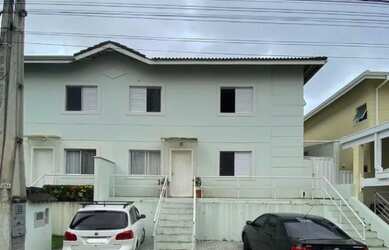 Imagem: A casa em condomínio possui 4 Dormitórios, 4 Banheiros, 3