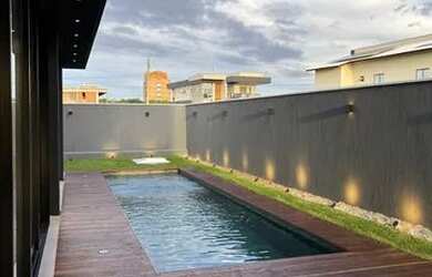 Imagem 6: Casa de condomínio para venda possui 357 metros quadrados com 5 quartos