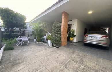 Imagem: A casa possui 5 Dormitórios, 5 Banheiros, 5 Vagas na garagem