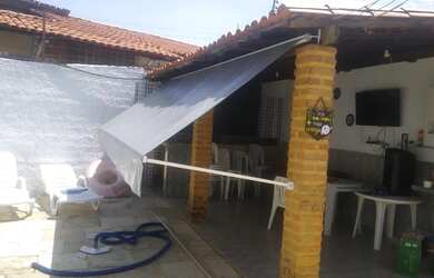 Imagem: A casa possui 4 Dormitórios, 2 Banheiros, 200m² de Área e