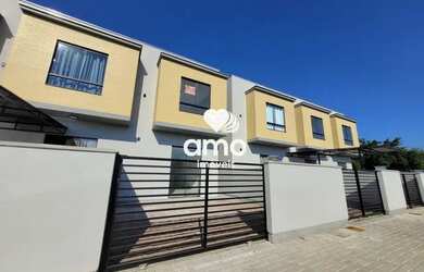 Imagem: A casa possui 2 Dormitórios, 2 Banheiros, 1 Vaga na garagem