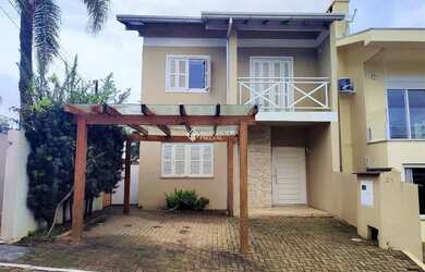 Imagem: A casa em condomínio possui 3 Dormitórios, 1 Banheiro, 2 Vagas