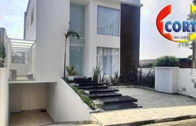 Imagem: A casa em condomínio possui 4 Dormitórios, 2 Banheiros, 2