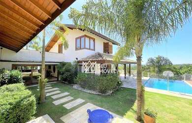 Imagem: A casa em condomínio possui 5 Dormitórios, 5 Banheiros, 5