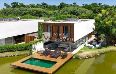 Imagem: A casa em condomínio possui 4 Dormitórios, 5 Banheiros, 4