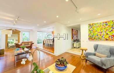 Imagem: A casa possui 4 Dormitórios, 5 Banheiros, 4 Vagas na garagem