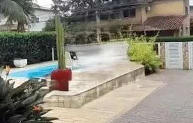 Imagem: A casa em condomínio possui 5 Dormitórios, 5 Banheiros, 4