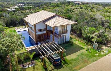 Imagem: A casa possui 4 Dormitórios, 4 Banheiros, 2 Vagas na garagem