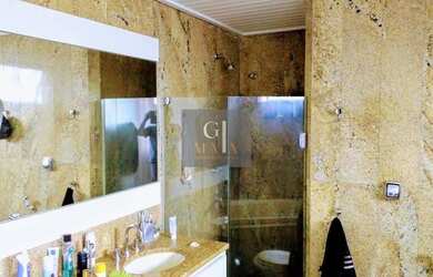 Imagem 16: 4 suites com vista total mar. 4 vagas de garagens e armários