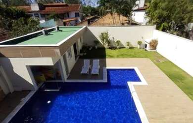 Imagem: A casa em condomínio possui 5 Dormitórios, 5 Banheiros, 4