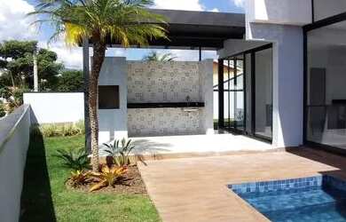 Imagem: A casa possui 3 Dormitórios, 5 Banheiros, 2 Vagas na garagem