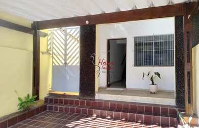 Imagem: A casa possui 2 Dormitórios, 2 Banheiros, 2 Vagas na garagem