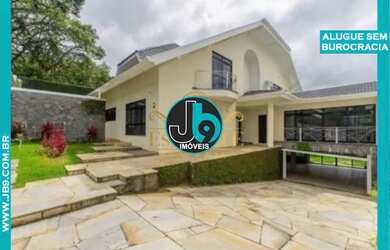 Imagem: A casa possui 4 Dormitórios, 5 Banheiros, 5 Vagas na garagem