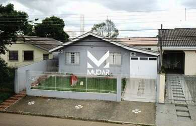 Imagem: A casa possui 3 Dormitórios, 1 Banheiro, 1 Vaga na garagem