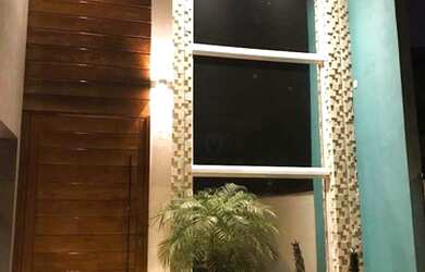 Imagem: A casa possui 2 Dormitórios, 3 Banheiros, 2 Vagas na garagem