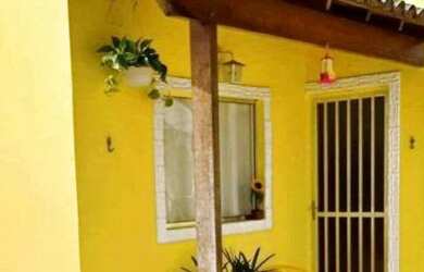 Imagem: A casa possui 2 Dormitórios, 1 Banheiro, 1 Vaga na garagem