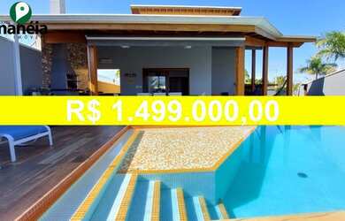 Imagem: A casa possui 3 Dormitórios, 5 Banheiros, 2 Vagas na garagem