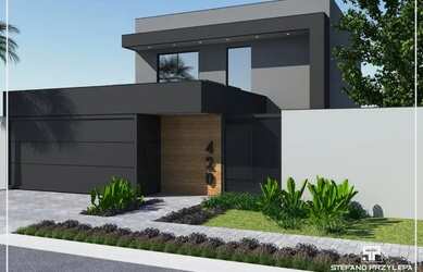 Imagem: A casa possui 3 Dormitórios, 2 Banheiros, 2 Vagas na garagem