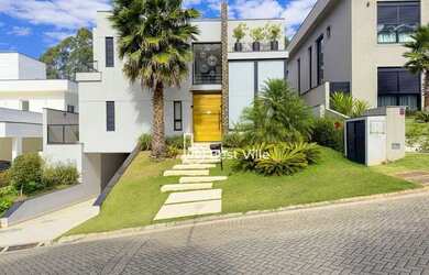 Imagem: A casa em condomínio possui 5 Dormitórios, 5 Banheiros, 5