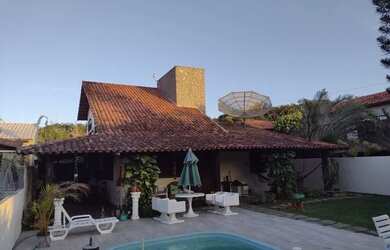 Imagem: A casa possui 3 Dormitórios, 4 Vagas na garagem e Imóvel novo