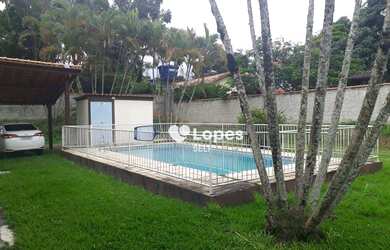 Imagem: A casa em condomínio possui 3 Dormitórios, 3 Banheiros, 5