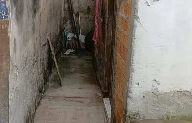 Imagem: A casa possui 3 Dormitórios e 1 Banheiro e está localizado