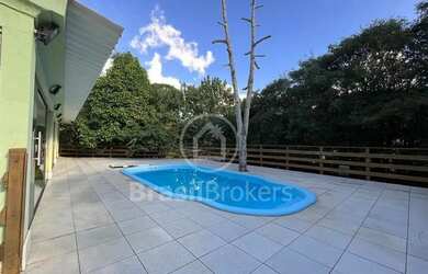 Imagem 8: Casa com 5 quartos e piscina e sauna