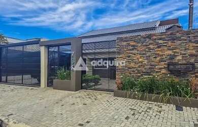 Imagem: A casa possui 5 Dormitórios, 5 Banheiros, 5 Vagas na garagem