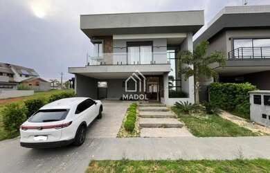 Imagem: A casa possui 3 Dormitórios, 4 Banheiros, 4 Vagas na garagem