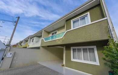 Imagem: A casa possui 3 Dormitórios, 2 Banheiros, 3 Vagas na garagem