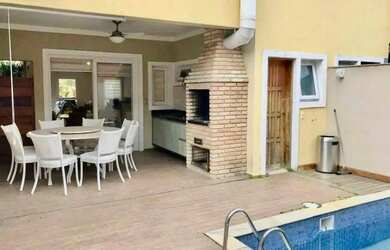 Imagem: A casa em condomínio possui 3 Dormitórios, 4 Banheiros, 2