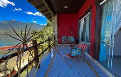 Imagem: A casa possui 5 Dormitórios, 5 Banheiros, 2 Vagas na garagem