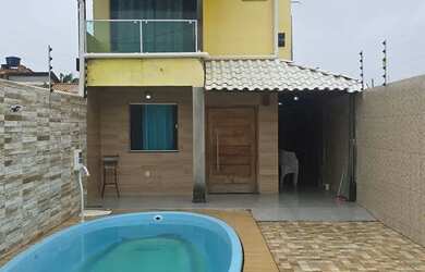 Imagem: A casa possui 3 Dormitórios, 5 Banheiros, 2 Vagas na garagem