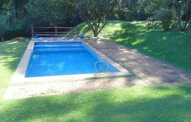 Imagem: A casa em condomínio possui 4 Dormitórios, 5 Banheiros, 4