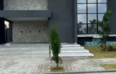 Imagem: A casa possui 4 Dormitórios, 4 Banheiros, 4 Vagas na garagem