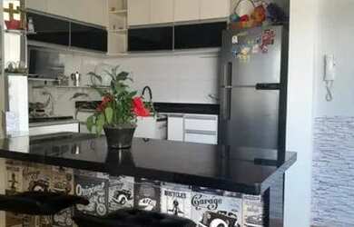 Imagem: A casa possui 3 Dormitórios, 2 Banheiros, 2 Vagas na garagem