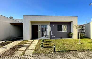 Imagem: A casa possui 2 Dormitórios, 1 Banheiro, 2 Vagas na garagem