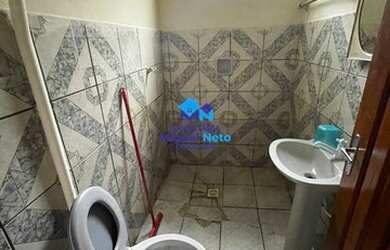 Imagem: A casa possui 2 Dormitórios, 1 Banheiro, 3 Vagas na garagem