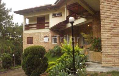 Imagem: A casa em condomínio possui 4 Dormitórios, 4 Banheiros, 5