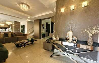 Imagem: A casa possui 3 Dormitórios, 5 Banheiros, 2 Vagas na garagem