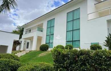 Imagem: A casa possui 4 Dormitórios, 5 Banheiros, 5 Vagas na garagem