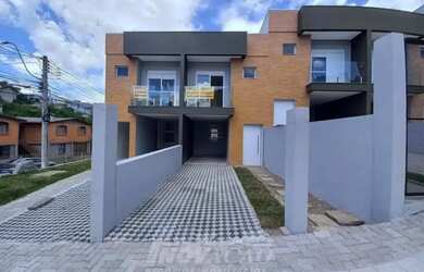 Imagem: A casa possui 3 Dormitórios, 3 Banheiros, 1 Vaga na garagem