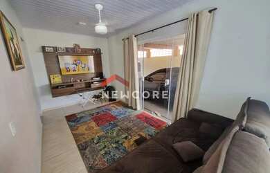 Imagem: A casa possui 3 Dormitórios, 2 Banheiros, 2 Vagas na garagem