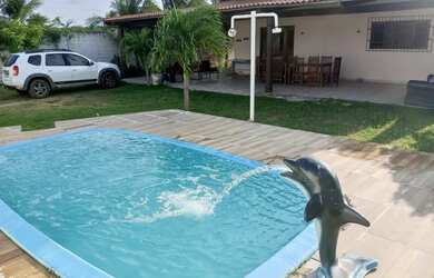 Imagem: A casa possui 4 Dormitórios, 3 Banheiros, 5 Vagas na garagem