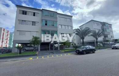 Imagem: O apartamento possui 3 Dormitórios, 1 Banheiro, 1 Vaga na garagem